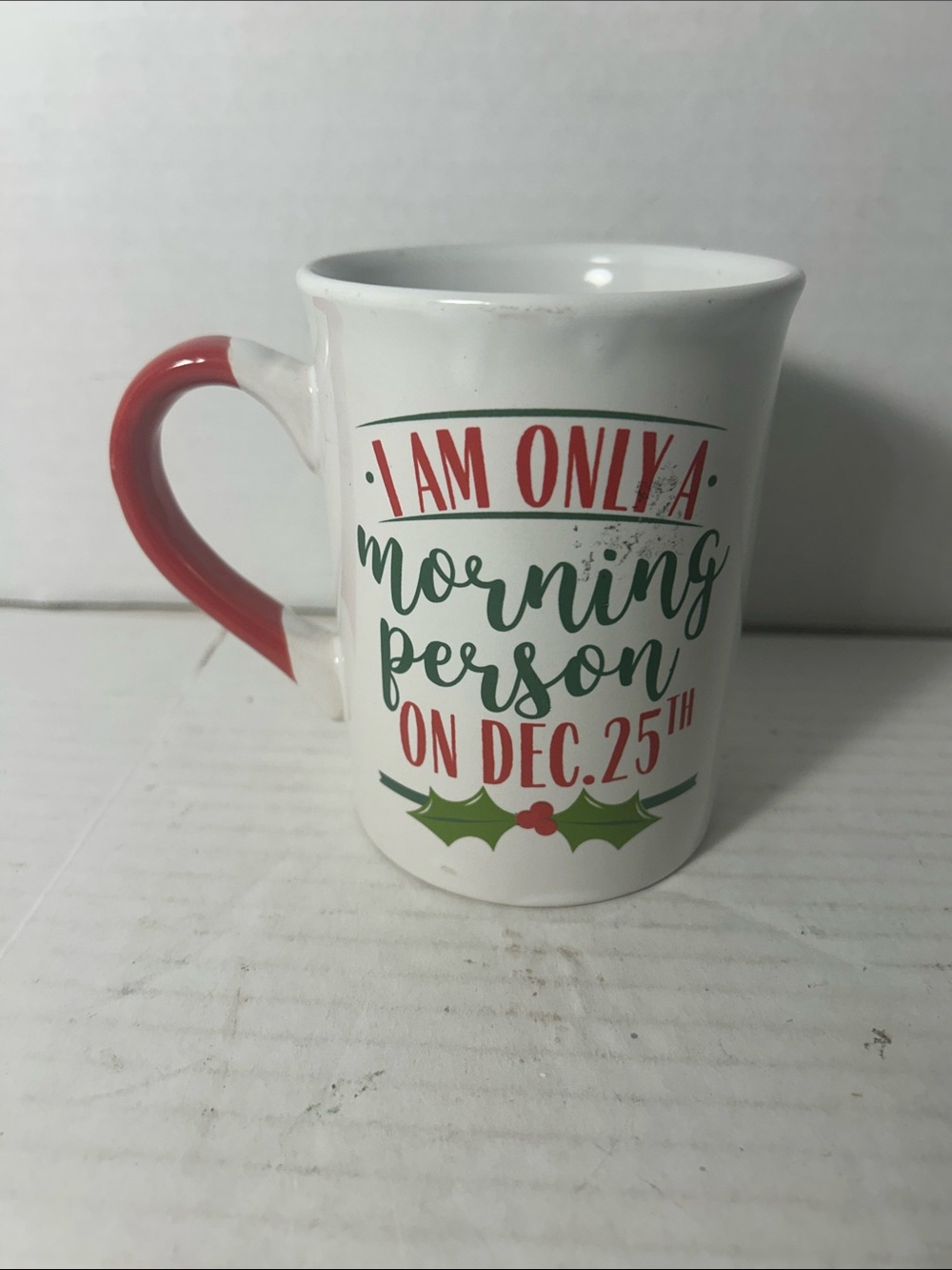 Royal Norfolk White Ceramic Holiday Mug with Red Handle and Green Script